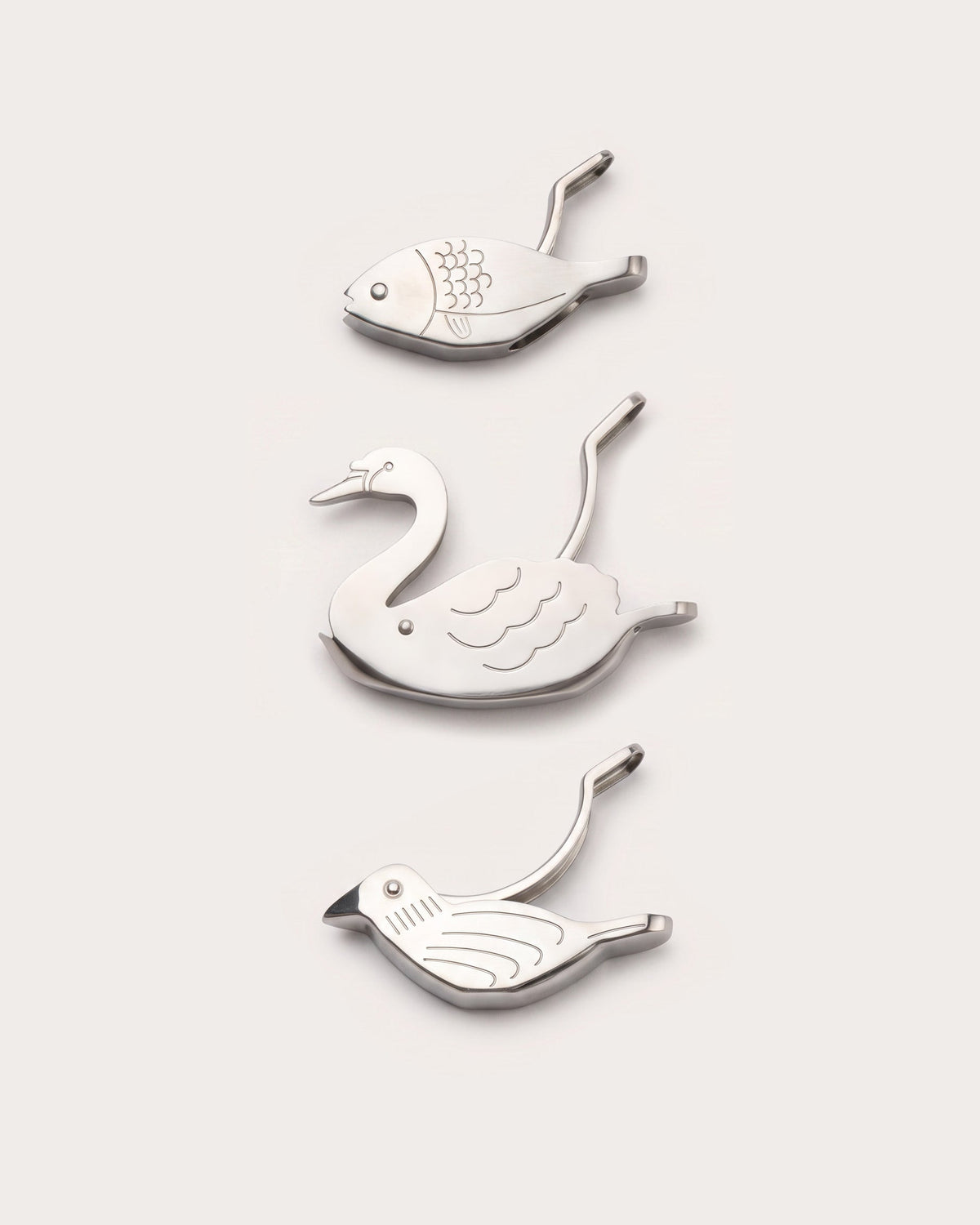 Bird, fish and swan stainless steel lemon squeezers, Gohar World